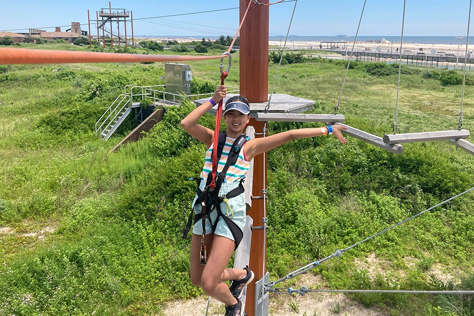 The spectacular ropes course at WildPlay Jones Beach gives climbers thrilling views of the beach. Photo by Diana Kim