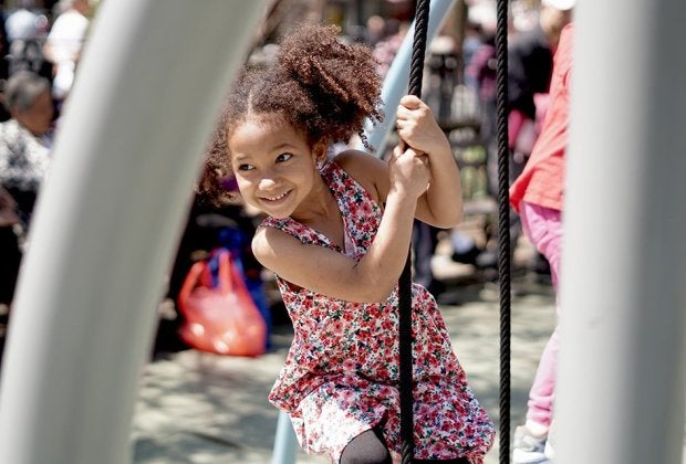 Climb on platforms dangling from ropes at Hester Street Playground. Photo by Jody Mercier