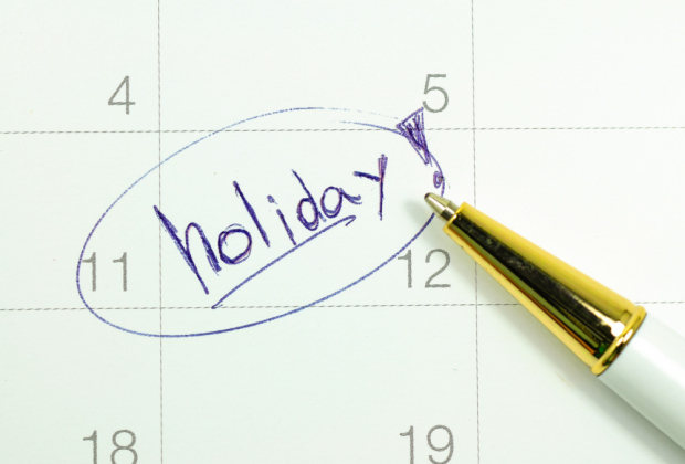 holiday written on a calendar with the date circled